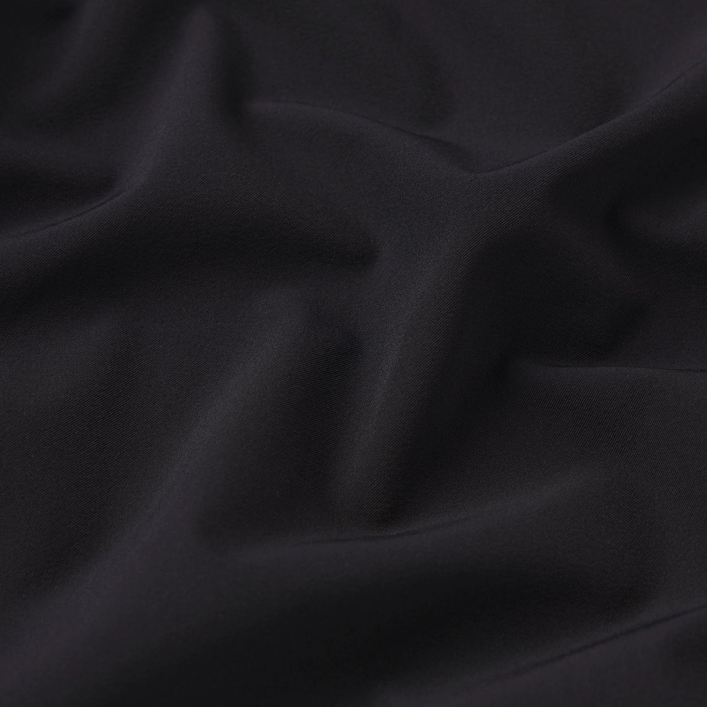 NikeSKIMS STRETCH NYLON OVERSIZED PANT | OBSIDIAN