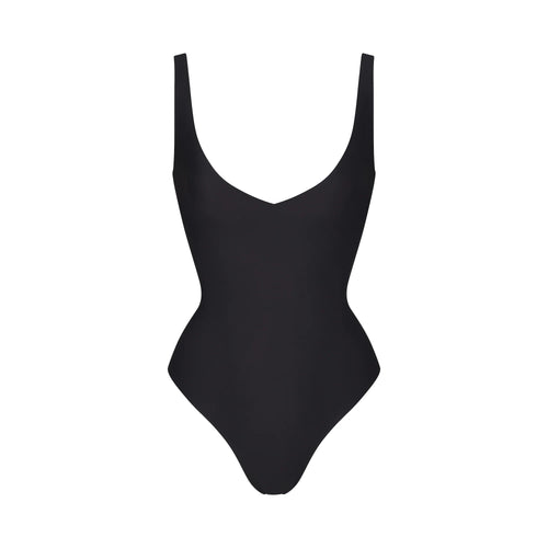 SKIMS BODY UNLINED PLUNGE THONG BODYSUIT | ONYX