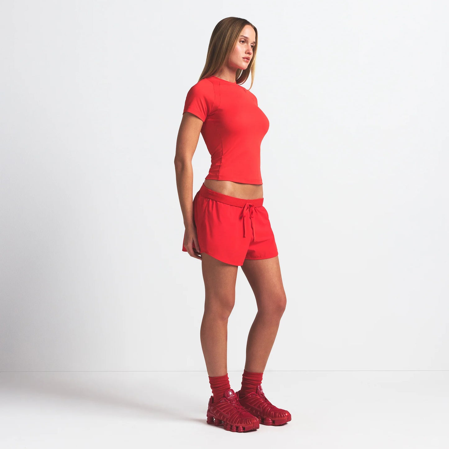 NikeSKIMS WOVEN NYLON 2.5" RUNNER SHORT | RUBY