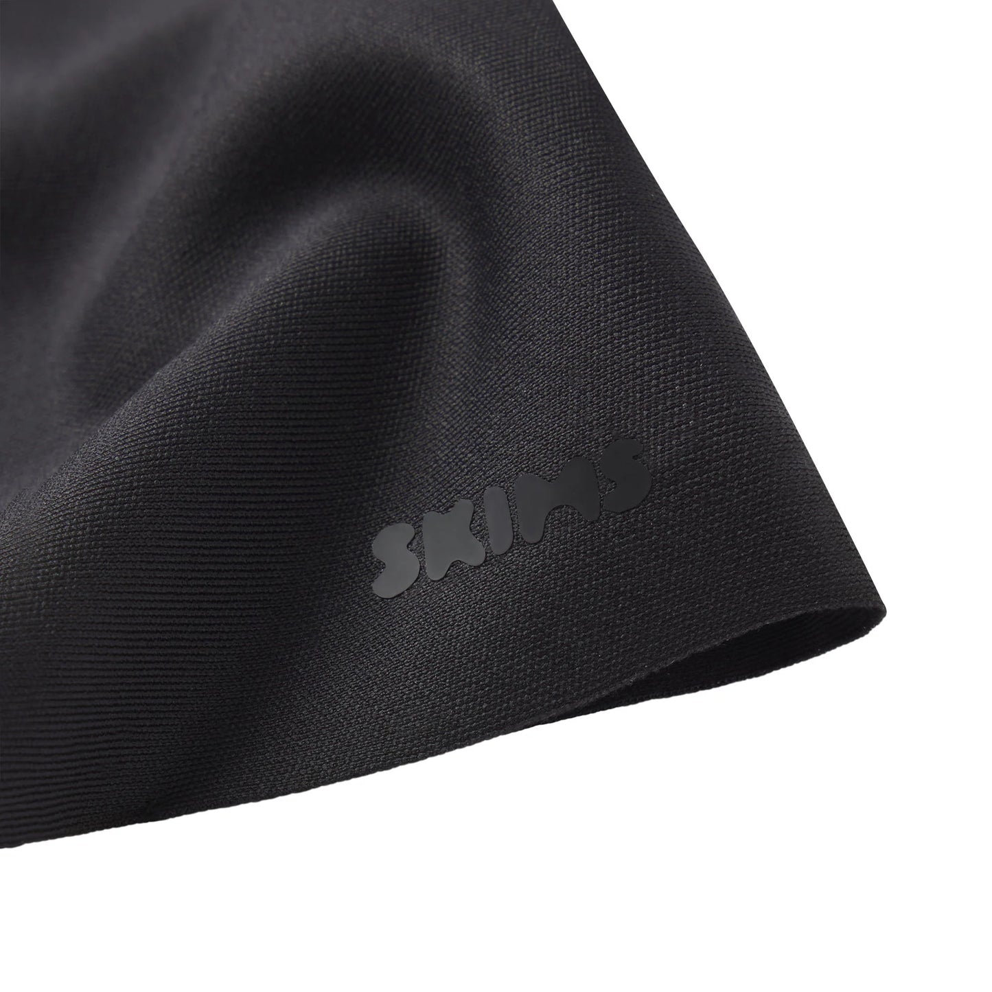 SKIMS BODY BUTT AND HIP ENHANCING MID THIGH SHORT | ONYX