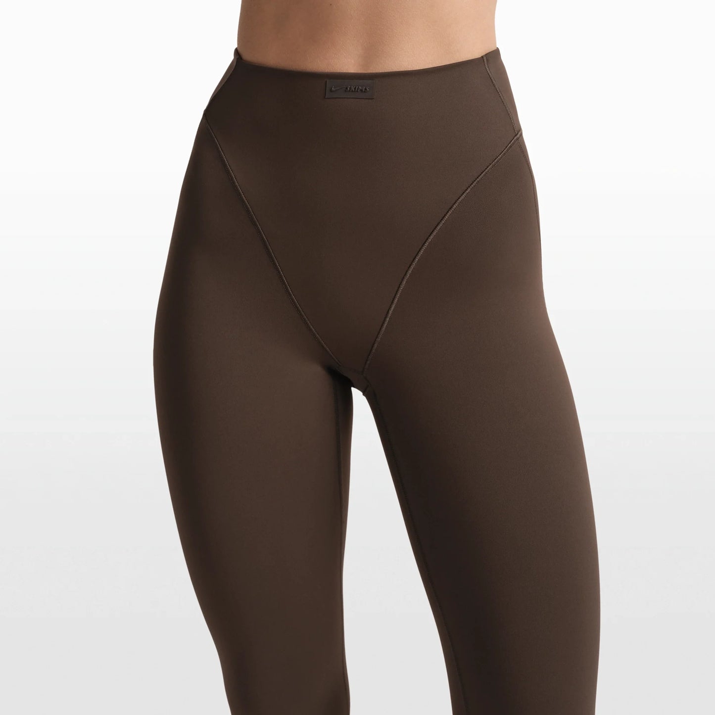 NikeSKIMS MATTE 17" V-LINE CAPRI LEGGING | DARK SEPIA