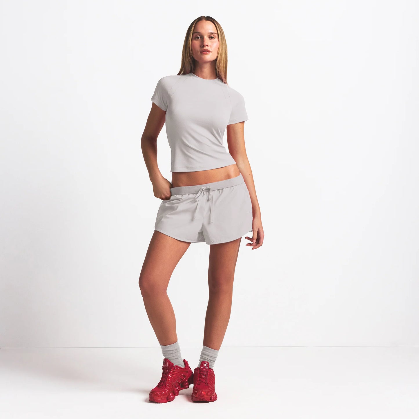 NikeSKIMS WOVEN NYLON 2.5" RUNNER SHORT | STONE