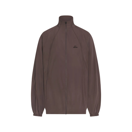 NikeSKIMS STRETCH NYLON OVERSIZED TRACK JACKET | RESIN