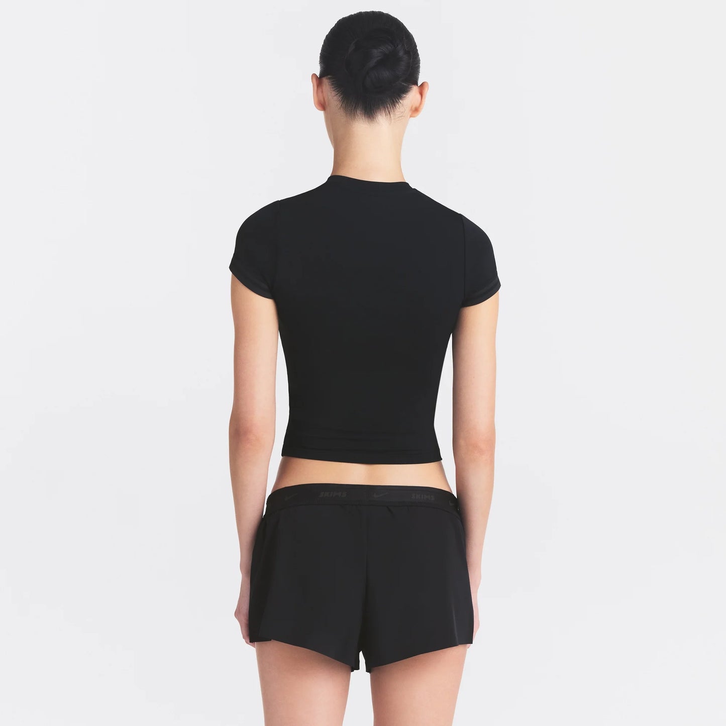 NikeSKIMS STRETCH KNIT CROPPED T-SHIRT | OBSIDIAN