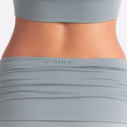 NikeSKIMS AIRY FOLDOVER SKORT | WASHED PACIFIC