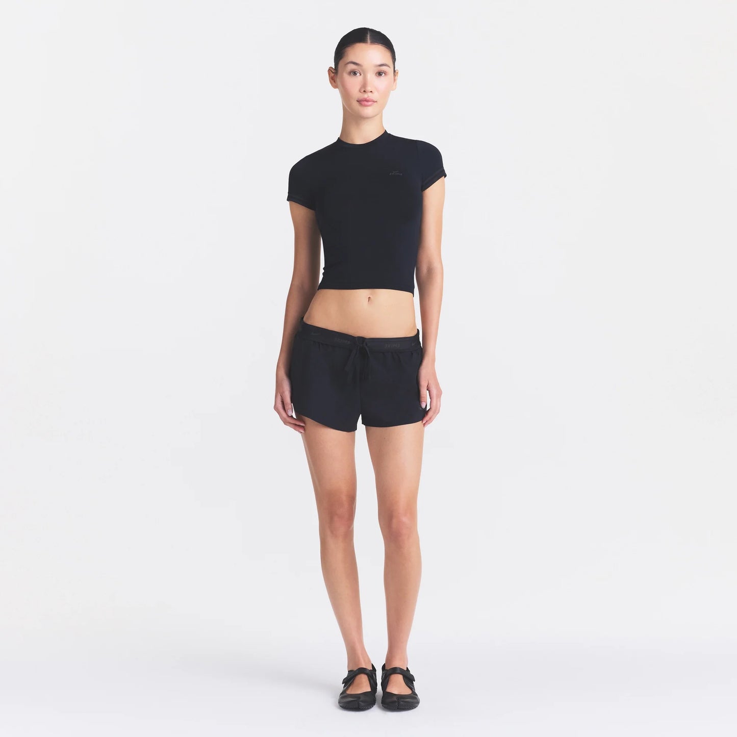 NikeSKIMS STRETCH KNIT CROPPED T-SHIRT | OBSIDIAN