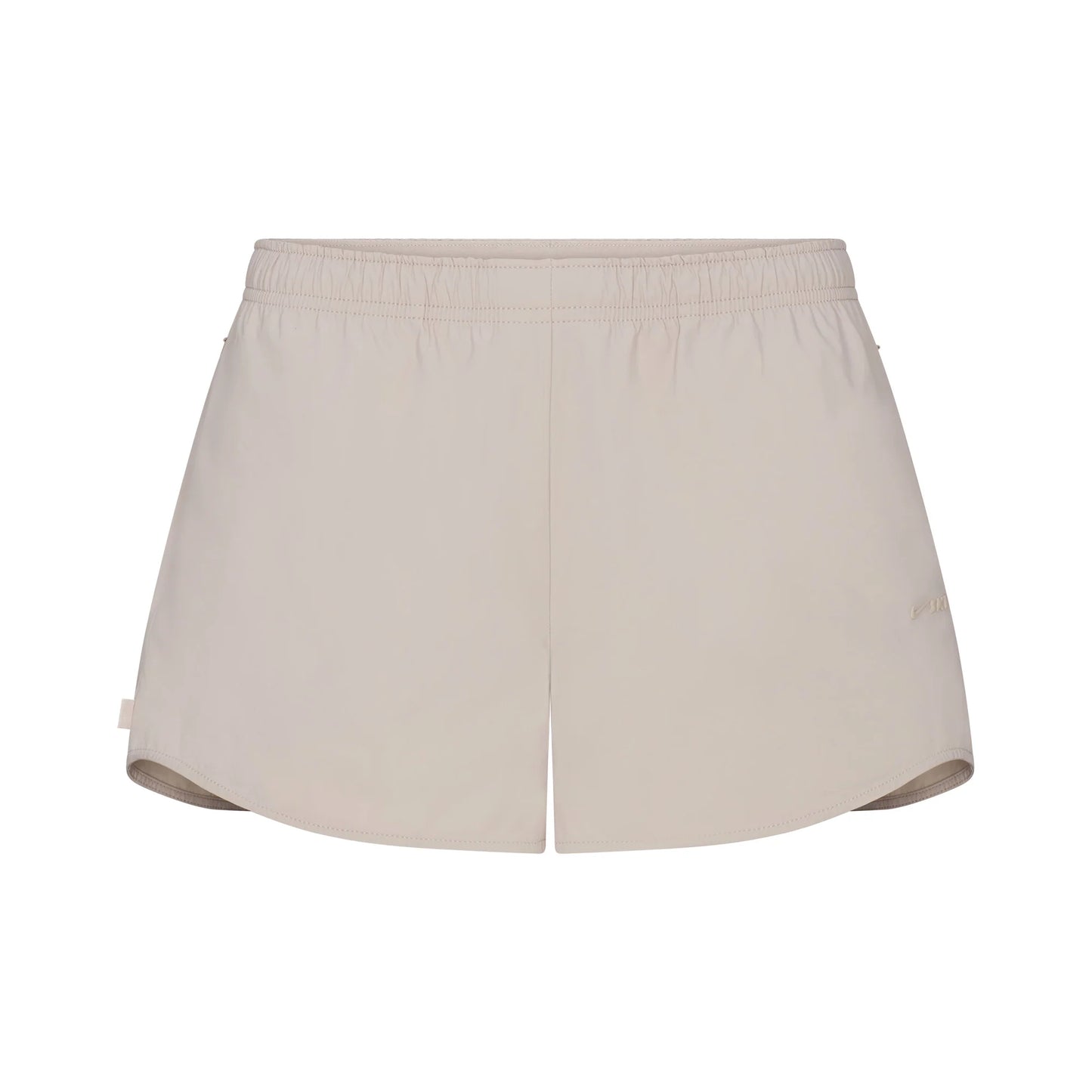 NikeSKIMS WOVEN NYLON 2.5" RUNNER SHORT | STONE