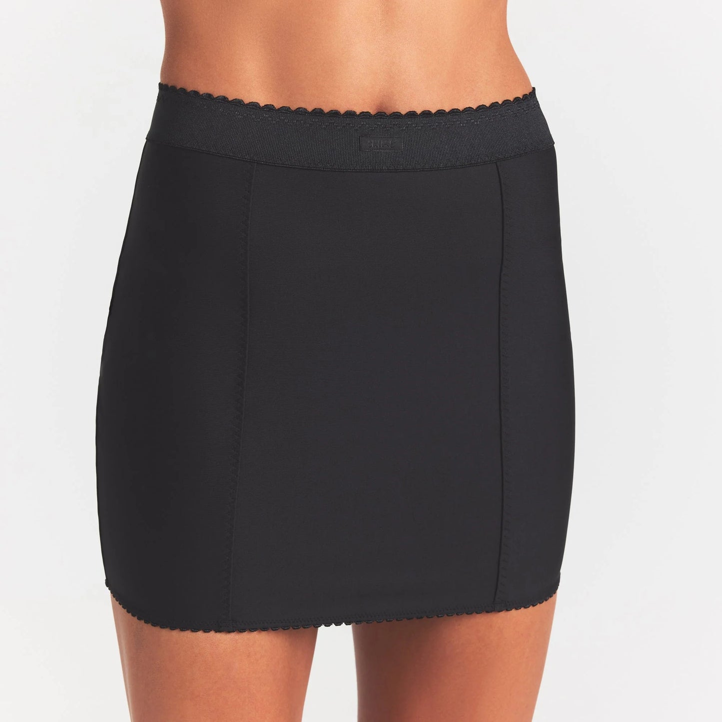 SKIMS BODY MINI GARTER SKIRT | ONYX