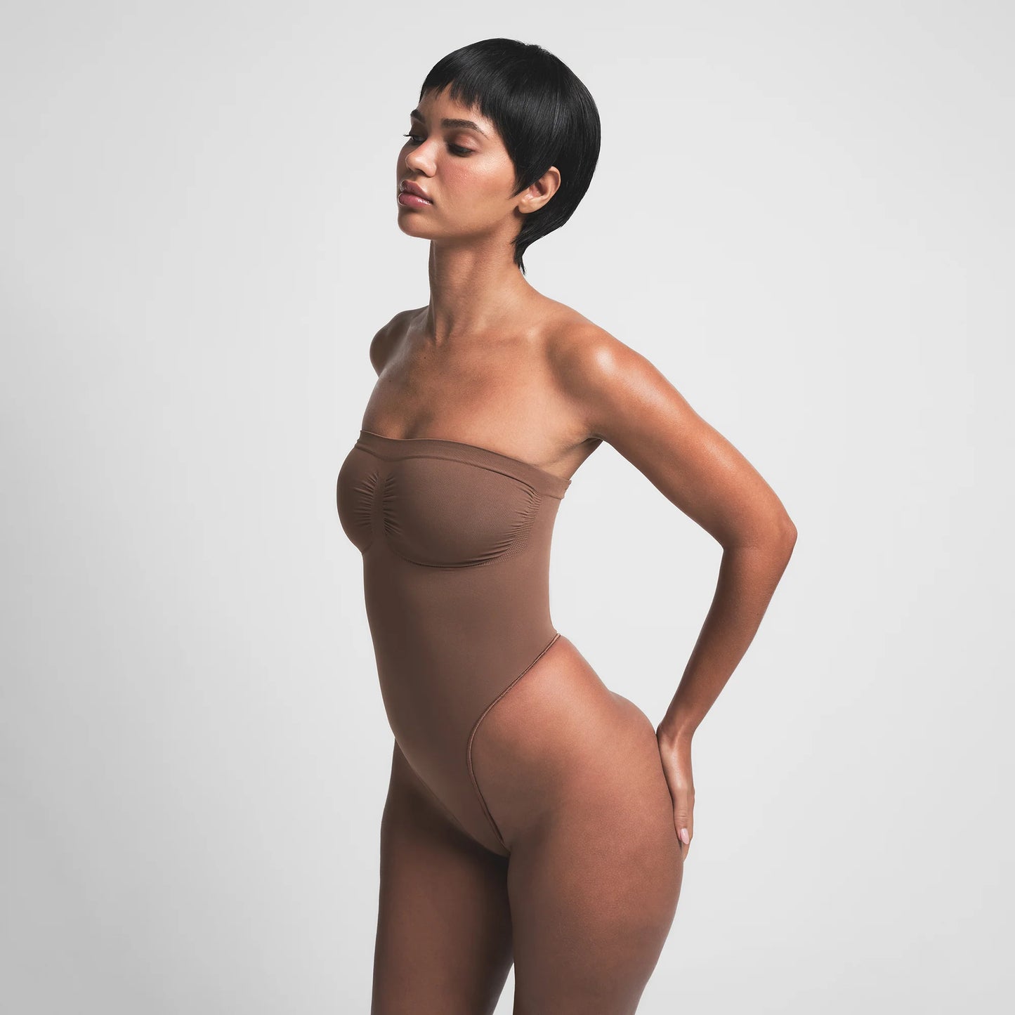 SEAMLESS SCULPT STRAPLESS THONG BODYSUIT | JASPER
