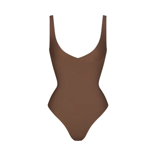 SKIMS BODY UNLINED PLUNGE THONG BODYSUIT | JASPER