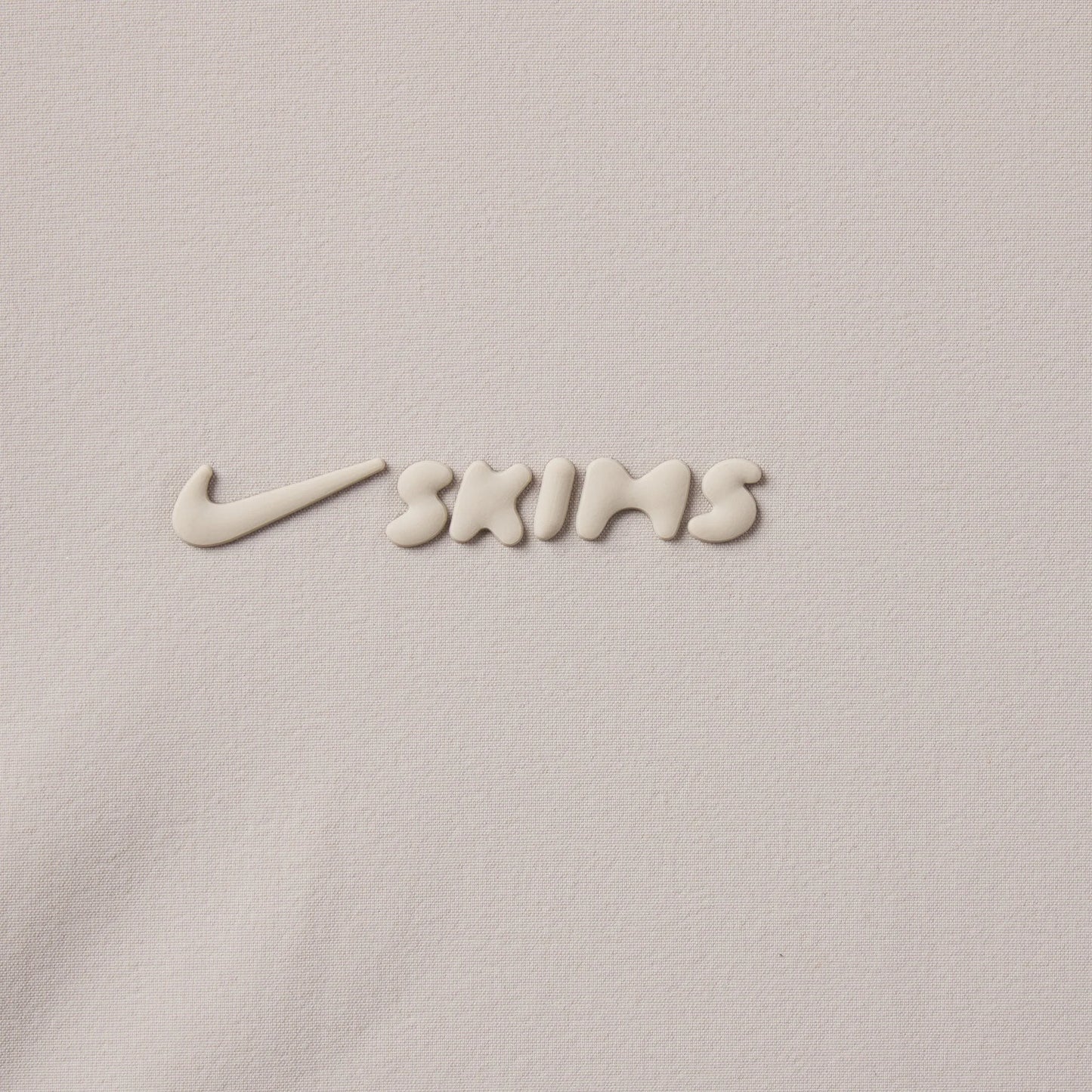 NikeSKIMS WOVEN NYLON CROP JACKET | STONE