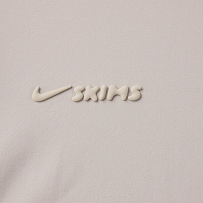 NikeSKIMS WOVEN NYLON CROP JACKET | STONE