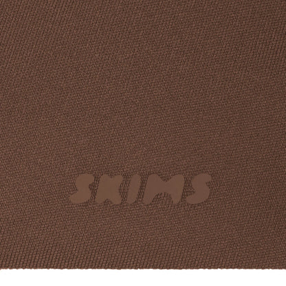 SKIMS ULTIMATE BODY PUSH-UP THONG BODYSUIT | JASPER