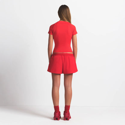 NikeSKIMS WOVEN NYLON 2.5" RUNNER SHORT | RUBY