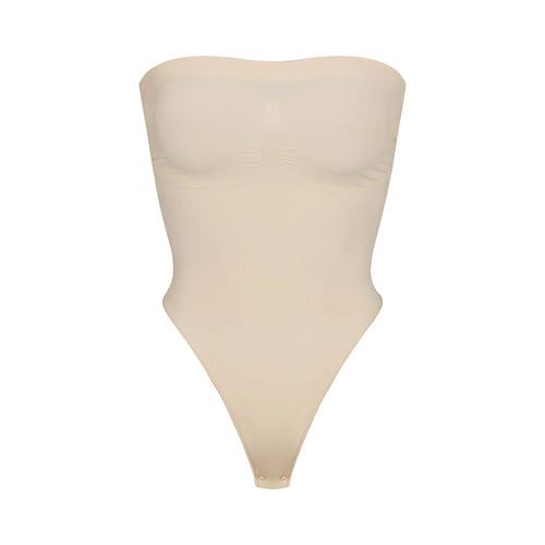 SEAMLESS SCULPT STRAPLESS THONG BODYSUIT | SAND